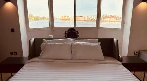 Katil atau katil-katil dalam bilik di Guided Hospitality - Luxury Accommodations