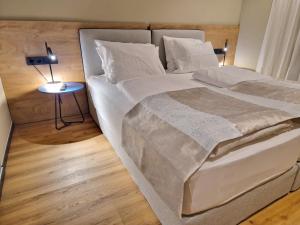 Postel nebo postele na pokoji v ubytování Hotel Wehra