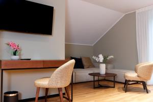 TV a/nebo společenská místnost v ubytování Hotel Wehra