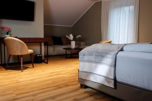 Postel nebo postele na pokoji v ubytování Hotel Wehra