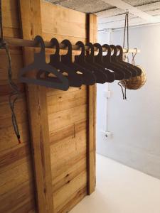a wine rack in a room with a wooden wall at Casa Luz in El Pozo de los Frailes