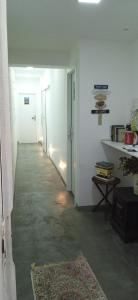 an empty hallway with a hallway leading to a room at Lapa Bed & Breakfast in Rio de Janeiro