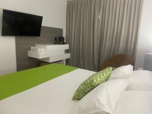 Letto o letti in una camera di Diamantchery - Vue mer avec Deck privatif