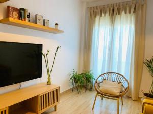 TV a/nebo společenská místnost v ubytování Apartamento Las Minas