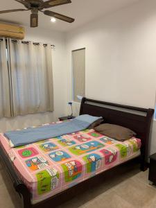 Llit o llits en una habitació de Villa Baan Roth Soi 112 Hua Hin