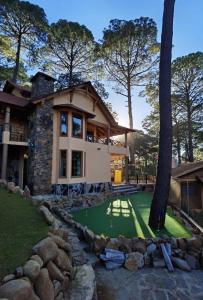 Φωτογραφία από το άλμπουμ του CABAÑA SIMA TOSCANO, Minigolf, Fogatero exterior y Área Infantil σε Mazamitla