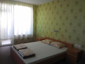 Postel nebo postele na pokoji v ubytování South Beach Hotel