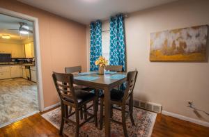 a dining room with a table and chairs at Cozy 2 Bedroom in Cleveland in Cleveland Heights
