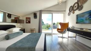 Postel nebo postele na pokoji v ubytování Refresh Boutique Apartments