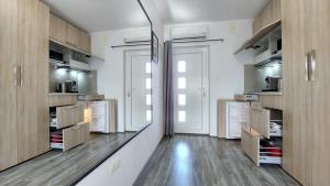 Kuchyň nebo kuchyňský kout v ubytování Refresh Boutique Apartments