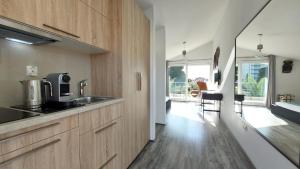 Kuchyň nebo kuchyňský kout v ubytování Refresh Boutique Apartments