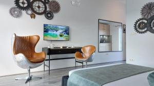 TV a/nebo společenská místnost v ubytování Refresh Boutique Apartments