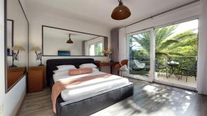Postel nebo postele na pokoji v ubytování Refresh Boutique Apartments