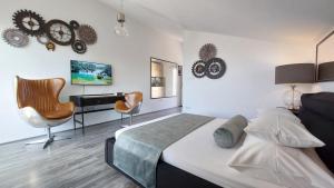 TV a/nebo společenská místnost v ubytování Refresh Boutique Apartments