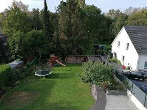 an aerial view of a yard with a playground at Aluston in Hannover