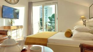 Postel nebo postele na pokoji v ubytování Refresh Boutique Apartments