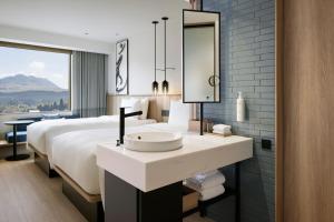 Fairfield by Marriott Kumamoto Aso客房内的一张或多张床位