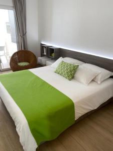 Letto o letti in una camera di Diamantchery - Vue mer avec Deck privatif