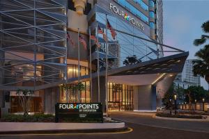 a front view of a four points hotel at Four Points by Sheraton Kuala Lumpur, City Centre in Kuala Lumpur