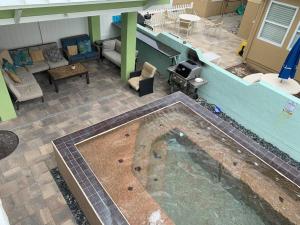 an overhead view of a living room with a couch at Bayside Cottage in Clearwater Beach