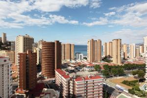 a view of a city with tall buildings at Dynastic Rooms Apartments in Benidorm