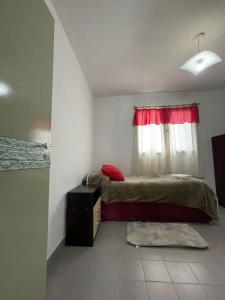 En eller flere senge i et værelse på La casita de sol + 10 billeder