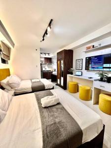 Katil atau katil-katil dalam bilik di Hotel Living, The Persimmon Double Beds (930)
