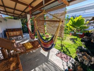 an overhead view of a hammock hanging from a porch at Astillo's Guest Houses in Moalboal