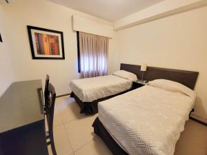 Postel nebo postele na pokoji v ubytování Hotel Genoves + 37 fotografií