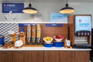 a store counter with fruits and vegetables on it at Holiday Inn Express Hotel & Suites Chattanooga-Lookout Mountain, an IHG Hotel in Chattanooga