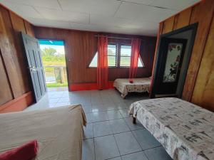Postel nebo postele na pokoji v ubytování Hotel Gaviotas de Osa