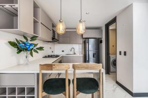 Kuchyň nebo kuchyňský kout v ubytování Apartamentos HOUSY Laureles