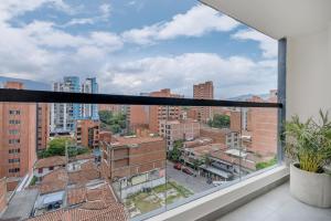 Nespecifikovaný výhled na destinaci Medellín nebo výhled na město při pohledu z aparthotelu