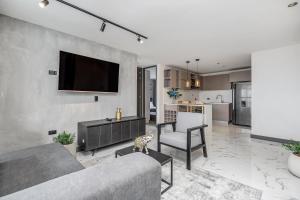 Kuchyň nebo kuchyňský kout v ubytování Apartamentos HOUSY Laureles