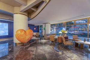 Zhangjiagang Pedestrian Street Manxin Hotel的休息区