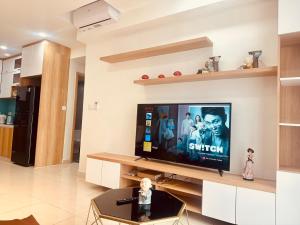 a living room with a flat screen tv at Căn hộ 2pn2wc Celadon City Aeon Mall Tân Phú in Ho Chi Minh City