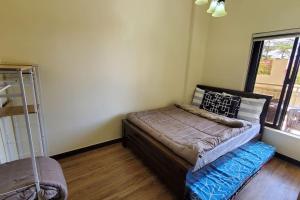 Cama ou camas em um quarto em A home, where you belong!(UNIT 119)