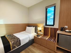Postel nebo postele na pokoji v ubytování ZOOM HOTEL