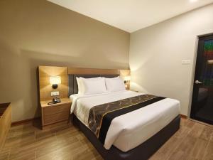 Postel nebo postele na pokoji v ubytování ZOOM HOTEL