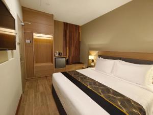 Postel nebo postele na pokoji v ubytování ZOOM HOTEL