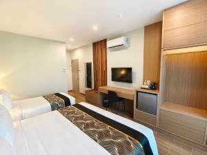TV a/nebo společenská místnost v ubytování ZOOM HOTEL