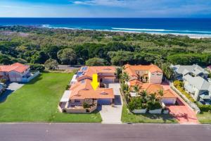 an aerial view of a house with the ocean at The Terrace in East Ballina