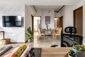 TV o dispositivi per l'intrattenimento presso High Floor New Bldg 4B2bLDK Ximending, Stunning Views • 高層新樓 4房2衛 西門町 美景