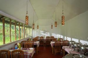 מסעדה או מקום אחר לאכול בו ב-Blue Bells Resort By Maat Hotels
