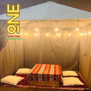 a room with two beds in a tent at ONE 7 FARM (DESI PARADISE FARM ) in Dubai