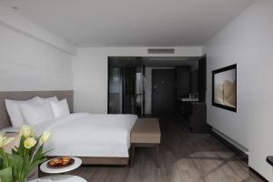 Postel nebo postele na pokoji v ubytování Jinxi Aerial Riverview Hotel - Chongqing Jiefangbei Hongya Cave