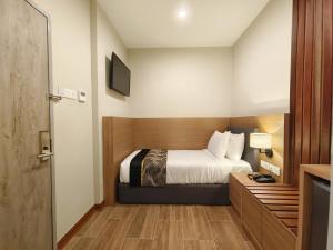 Postel nebo postele na pokoji v ubytování ZOOM HOTEL