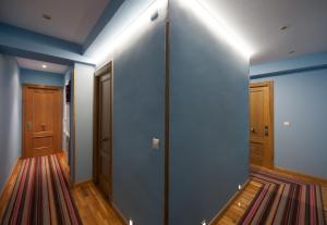 Cama o camas de una habitación en Hostal Bezana