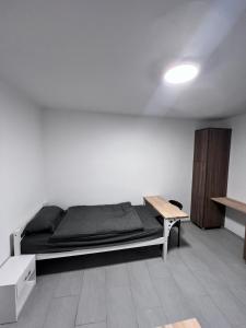 Vuode tai vuoteita majoituspaikassa Zimmervermietung Ennsdorf