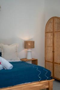 Letto o letti in una camera di CASA BIARI : Tropical Vibes - 3 min from beach